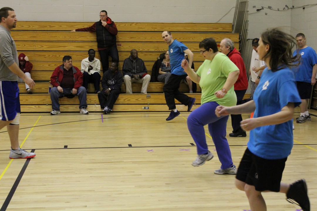 High knees during warm up for basketball practice. - Projectid