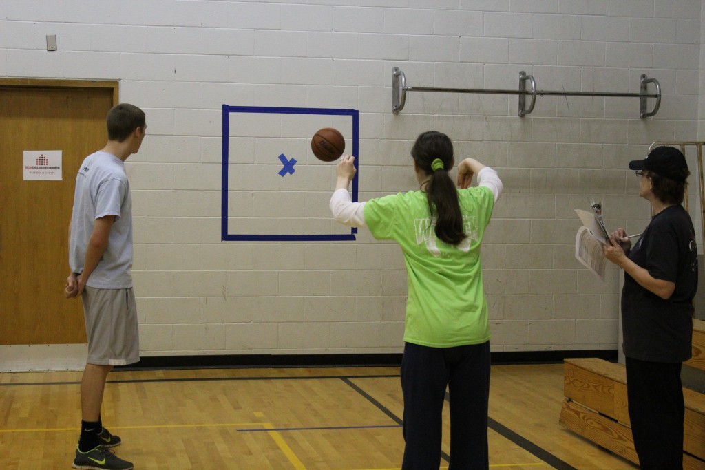 practicing-passing-skills-at-basketball-practice-projectid